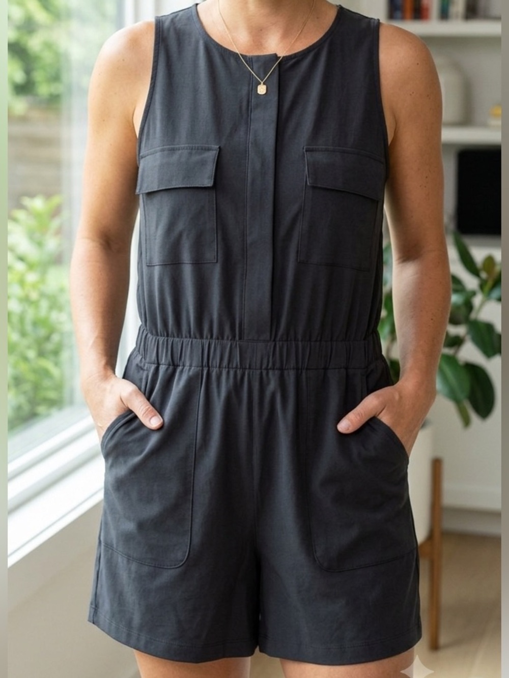 Zella Black Sleeveless Romper with Scoop Neck